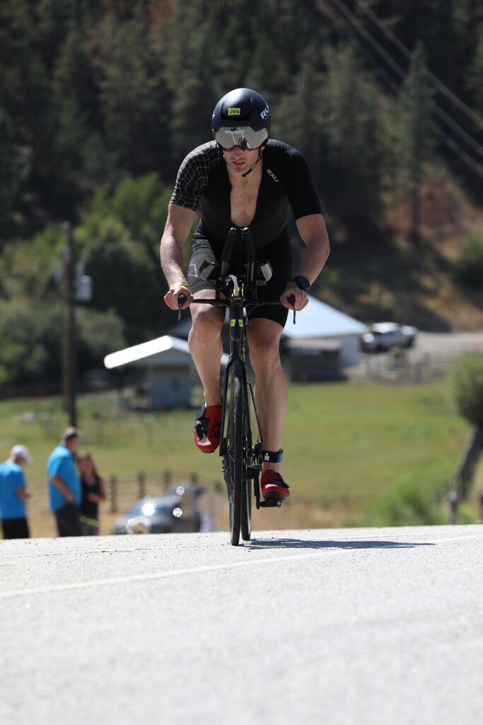 Jay climbing on the bike during the 2024 season